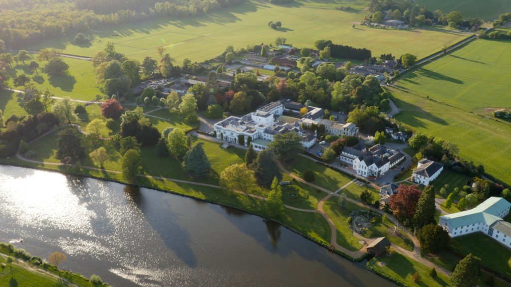 An aerial photo of Henley Business School campus in Greenlands alongside the River Thames