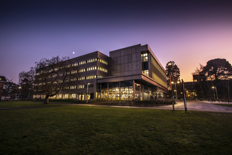 An outside photo of the Library at night