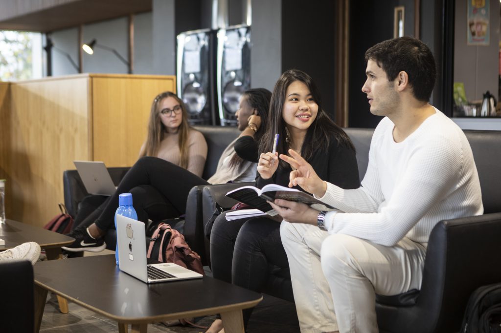Library cafe students talking