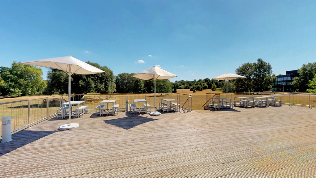A photo of Meadow Suite decking area with view of the meadow