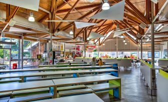 The Square tables and students dining