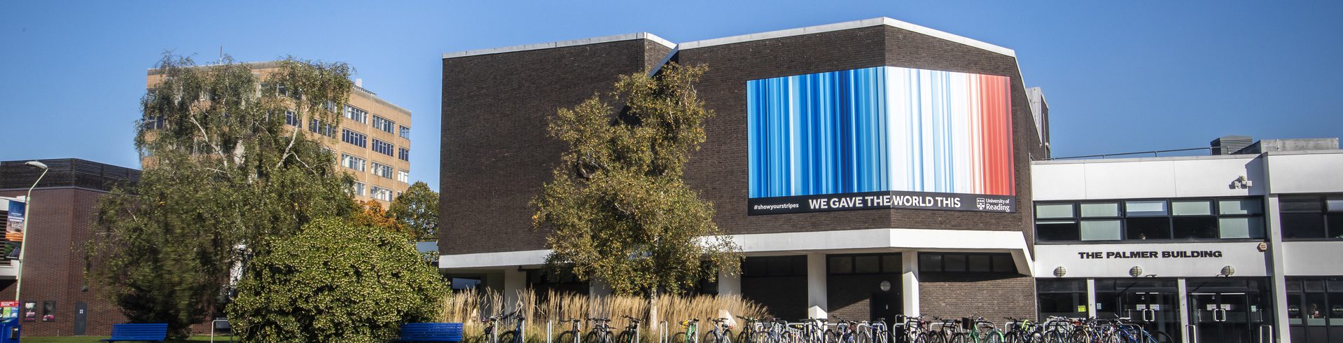 The climate stripes graphic on the Palmer Building on Whiteknights campus.