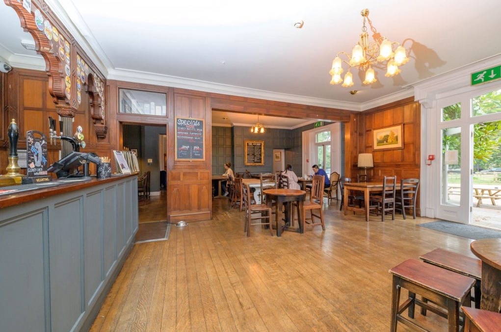 A photo of bar and seating area in park house